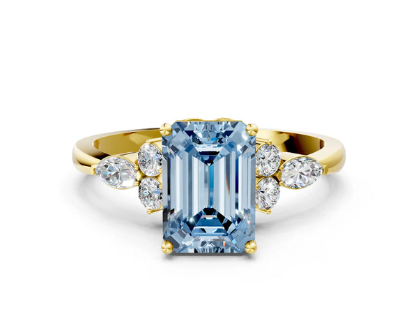 Yellow gold Fancy Blue Emerald Cut Brilliant Diamond Solitaire Ring with Pear Side Stones and Four-Prong Setting