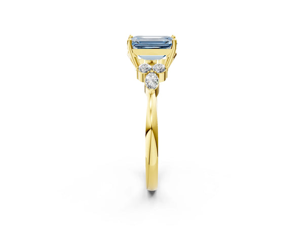 Yellow gold Fancy Blue Emerald Cut Brilliant Diamond Solitaire Ring with Pear Side Stones and Four-Prong Setting
