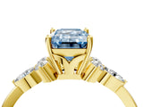 Yellow gold Fancy Blue Emerald Cut Brilliant Diamond Solitaire Ring with Pear Side Stones and Four-Prong Setting_7