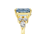 Yellow gold Fancy Blue Emerald Cut Brilliant Diamond Solitaire Ring with Pear Side Stones and Four-Prong Setting_8