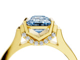 Yellow gold Fancy Blue Emerald Cut Brilliant Solitaire Diamond Ring with Channel Set Band and Bar Prong Setting_4
