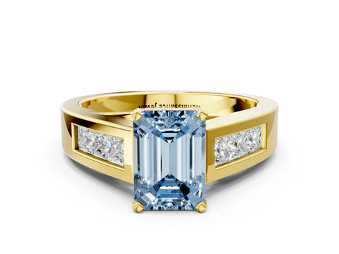 Yellow gold Fancy Blue Emerald Cut Cut Channel Set Solitaire Ring with Four-Prong Setting