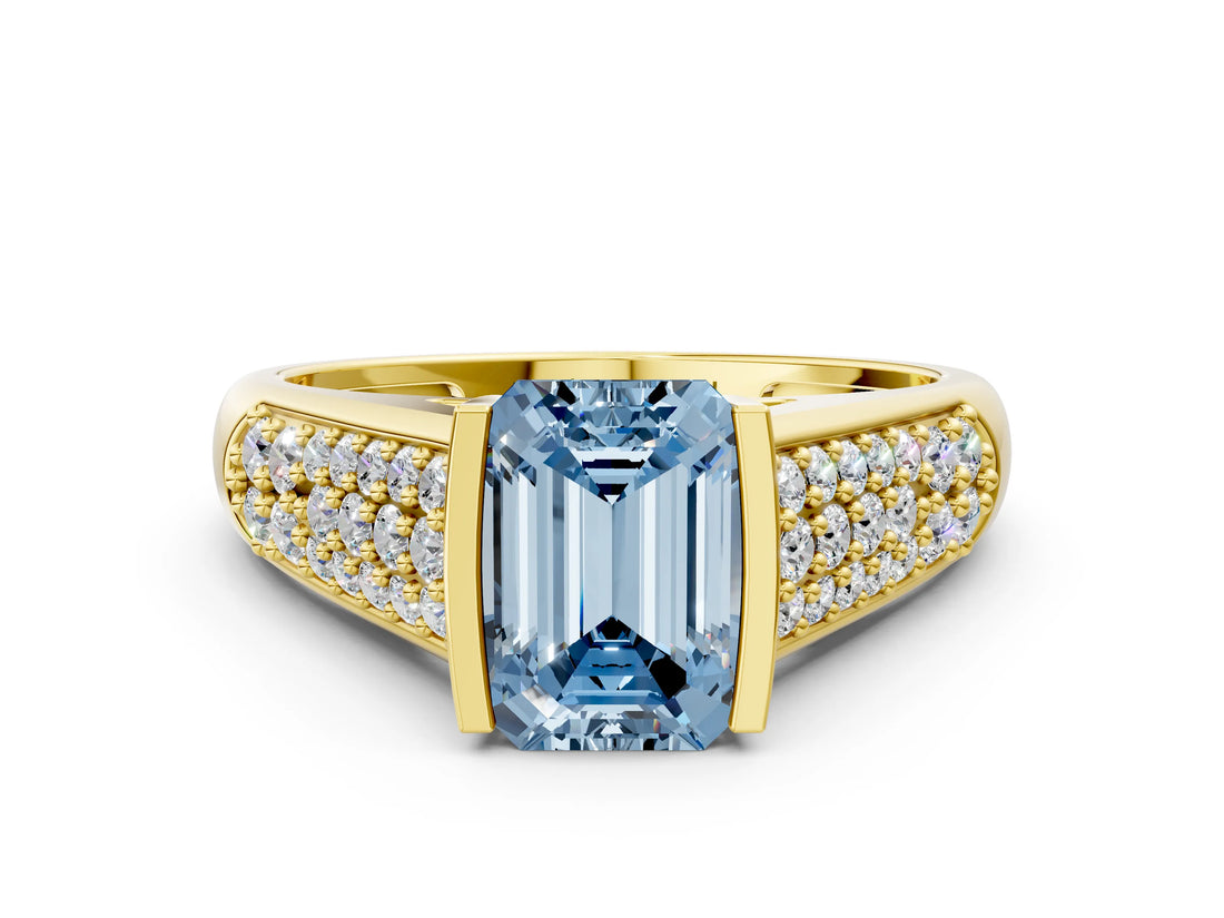 Yellow gold Fancy Blue Emerald Cut Cut Diamond Channel Set Pave Band with Tension Prong Setting