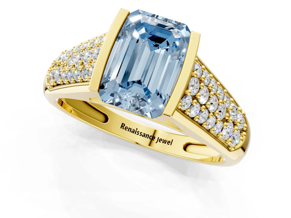 Yellow gold Fancy Blue Emerald Cut Diamond Channel Set Pave Band with Tension Prong Setting