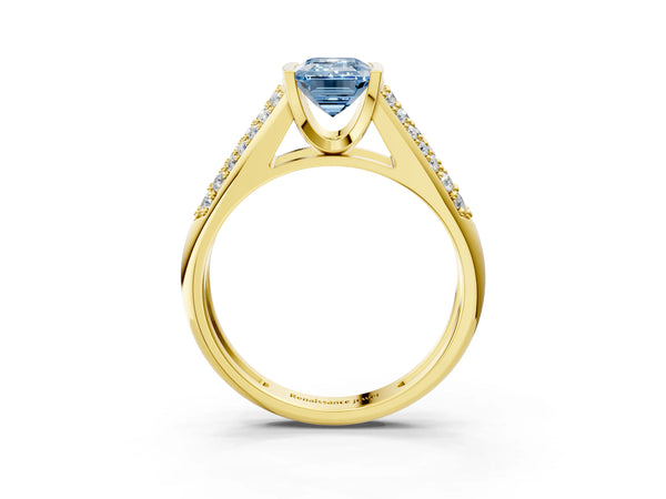Yellow gold Fancy Blue Emerald Cut Diamond Channel Set Pave Band with Tension Prong Setting