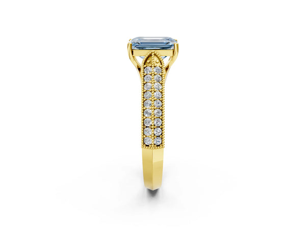 Yellow gold Fancy Blue Emerald Cut Cut Pave Split Shank Engagement Ring with Four-Prong Setting