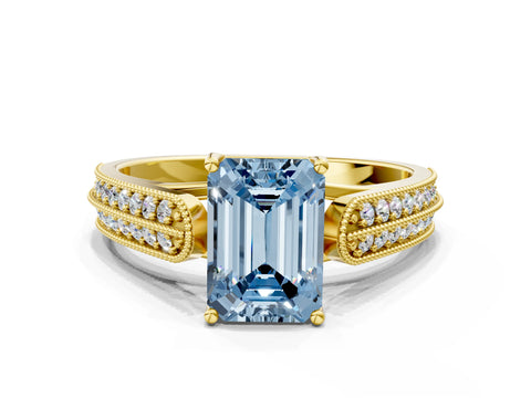 Yellow gold Fancy Blue Emerald Cut Cut Pave Split Shank Engagement Ring with Four-Prong Setting