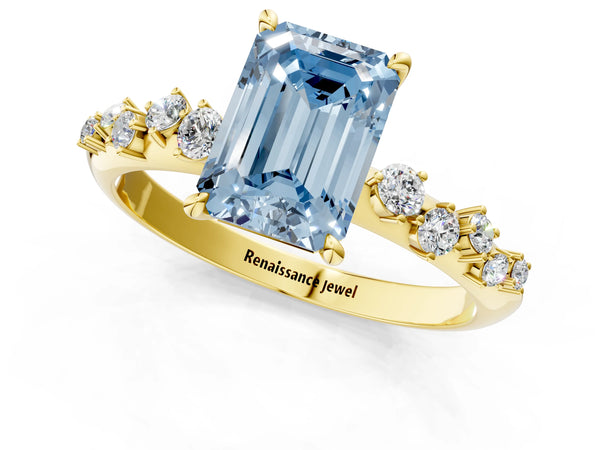Yellow gold Fancy Blue Emerald Cut Diamond Cluster Side Stone Solitaire Ring with Prong Setting