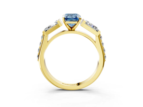 Yellow gold Fancy Blue Emerald Cut Diamond Engagement Ring with Baguette Side Stones and Channel Set Band