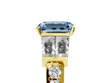 Yellow gold Fancy Blue Emerald Cut Diamond Engagement Ring with Baguette Side Stones and Channel Set Band_25