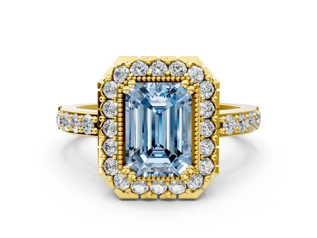 Yellow gold Fancy Blue Emerald Cut Diamond Halo Ring with Pavé Band and Prong Setting