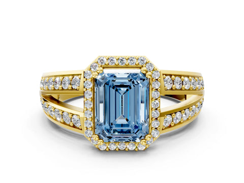 Yellow gold Fancy Blue Emerald Cut Diamond Halo Ring with Split Shank Pavé Band and Four-Prong Setting