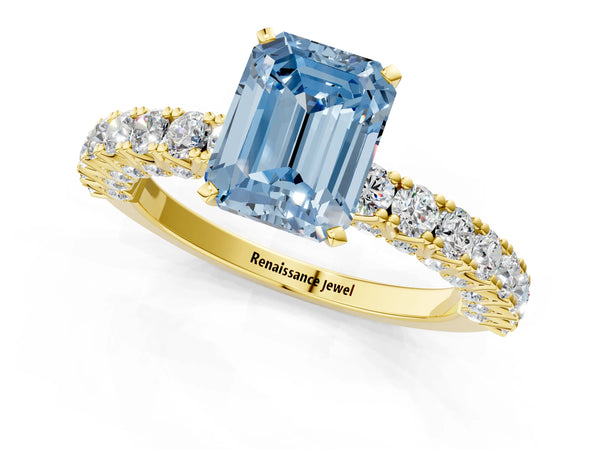Yellow gold Fancy Blue Emerald Cut Diamond Pavé Band Solitaire Ring with Prong Setting
