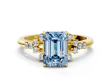 Yellow gold Fancy Blue Emerald Cut Diamond Ring with Side Stones and Four-Prong Setting_92