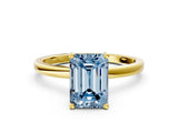 Yellow gold Fancy Blue Emerald Cut Diamond Solitaire Ring with Classic Band and Four-Prong Setting