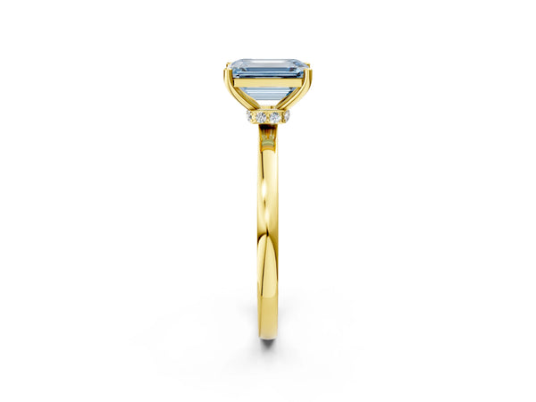 Yellow gold Fancy Blue Emerald Cut Diamond Solitaire Ring with Classic Band and Four-Prong Setting