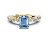 Yellow gold Fancy Blue Emerald Cut Diamond Solitaire Ring with Shared Prong Pavé Band and Four-Prong Setting_57