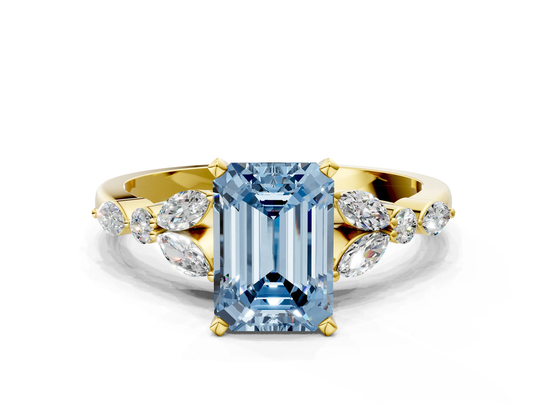 Yellow gold Fancy Blue Emerald Cut Diamond Solitaire Ring with Side Stones and Four-Prong Setting_243