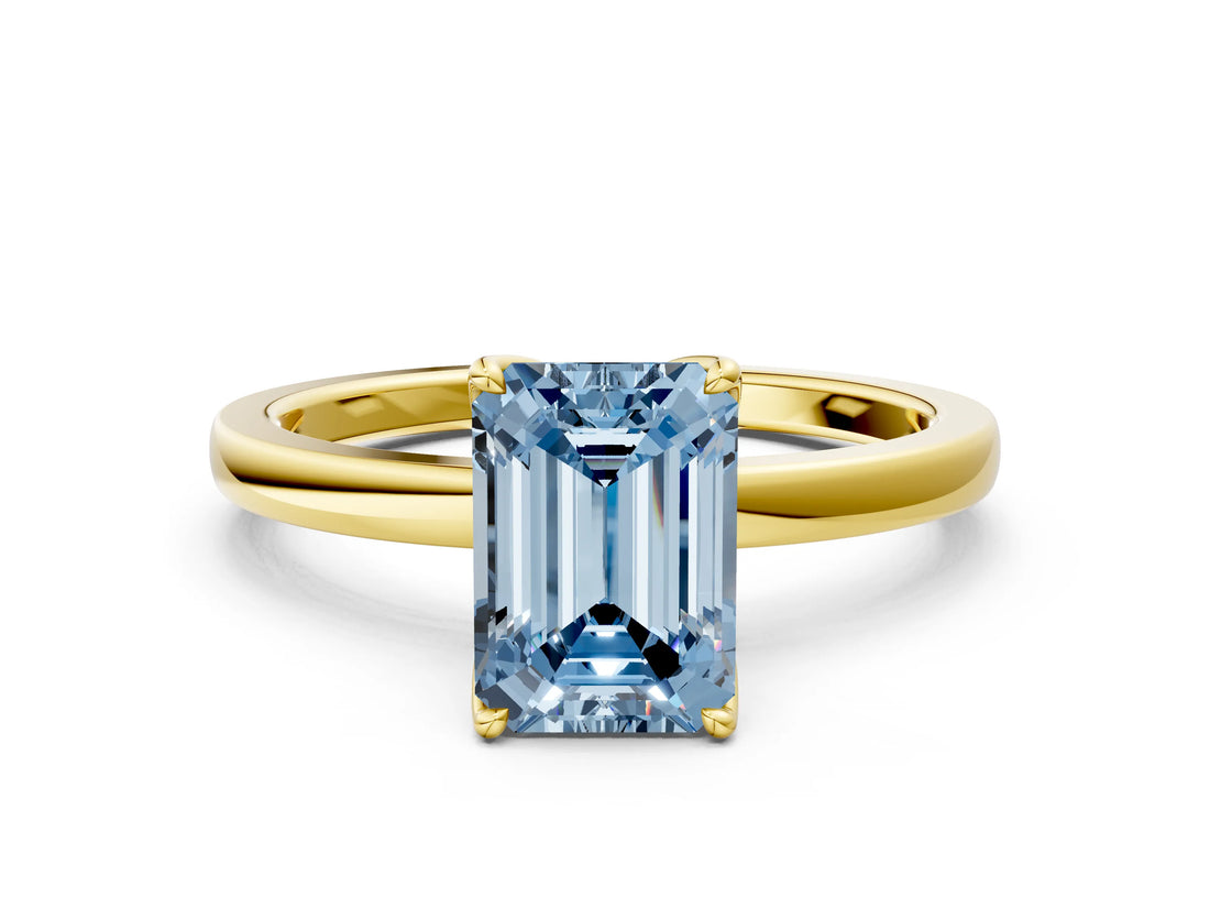 Yellow gold Fancy Blue Emerald Cut Diamond Solitaire Ring with Thin Band and Prong Setting_12