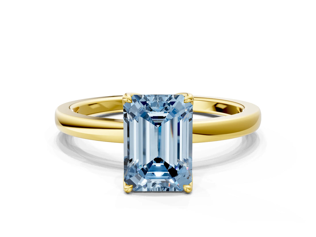 Yellow gold Fancy Blue Emerald Cut Diamond Solitaire Ring with Thin Band and Prong Setting_24