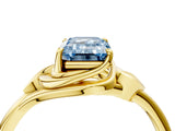 Yellow gold Fancy Blue Emerald Cut Diamond Solitaire Ring with Twist Band and Four-Prong Setting_61