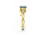 Yellow gold Fancy Blue Emerald Cut Diamond Solitaire Ring with Twisted Band and Prong Setting_235