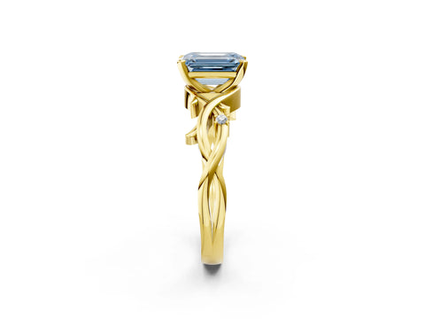 Yellow gold Fancy Blue Emerald Cut Diamond Solitaire Ring with Twisted Band and Prong Setting_235