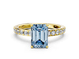 Yellow gold Fancy Blue Emerald  Cut Diamond Solitaire with Pave Band and Four-Prong Setting