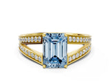 Yellow gold Fancy Blue Emerald Cut Diamond Split Shank Ring with Pavé Band and Four-Prong Setting_44