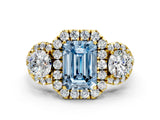 Yellow gold Fancy Blue Emerald Cut Diamond Three-Stone Halo Ring with Prong Setting and Pavé Accents