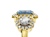 Yellow gold Fancy Blue Emerald Cut Diamond Three-Stone Halo Ring with Prong Setting and Pavé Accents_5