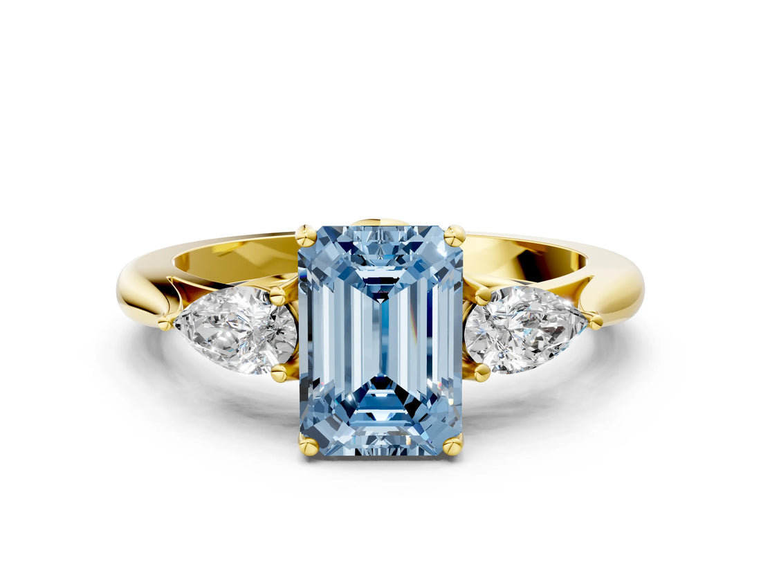 Yellow gold Fancy Blue Emerald Cut Diamond Three-Stone Ring with Pear Side Stones and Four-Prong Setting_72