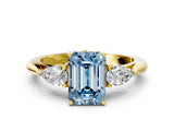 Yellow gold Fancy Blue Emerald Cut Diamond Three-Stone Ring with Pear Side Stones and Four-Prong Setting_72