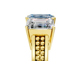 Yellow gold Fancy Blue Emerald Cut Diamond Three-Stone Ring with Prong Setting and Textured Band_5
