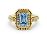 Yellow gold Fancy Blue Emerald Cut Halo Diamond Ring with Beaded Split Shank and Four-Prong Setting