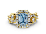 Yellow gold Fancy Blue Emerald Cut Halo Diamond Ring with Milgrain and Bezel Accents on a Split Shank Band_24