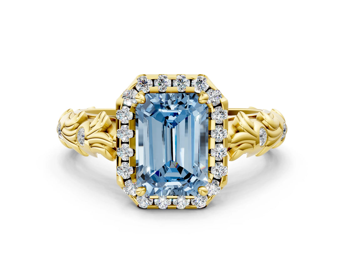 Yellow gold Fancy Blue Emerald Cut Halo Diamond Solitaire with Filigree Band and Four-Prong Setting