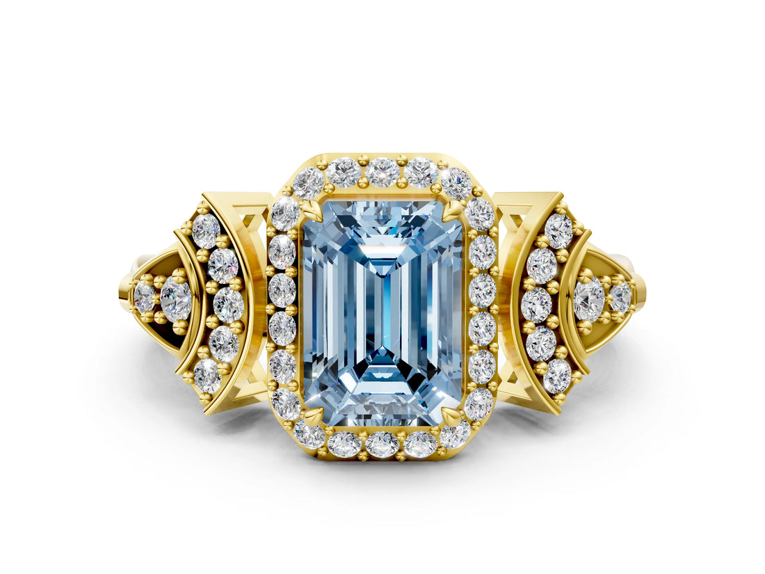 Yellow gold Fancy Blue Emerald Cut Halo Diamond Split Shank Engagement Ring with Four-Prong Setting