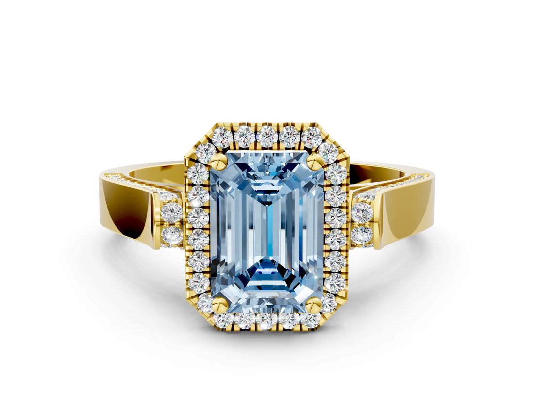 Yellow gold Fancy Blue Emerald Cut Halo Round Diamond Twist Band with Four-Prong Setting