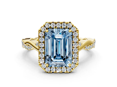 Yellow gold Fancy Blue Emerald Cut Halo Twist Band with Four-Prong Setting