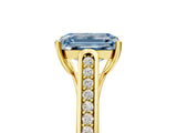 Yellow gold Fancy Blue Emerald Cut Solitaire Cathedral Diamond Engagement Ring with Channel-Set Band and Four-Prong Setting_8