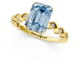 Yellow gold Fancy Blue Emerald Cut Solitaire Diamond Ring with Infinity Twist Band and Four-Prong Setting_1