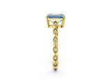 Yellow gold Fancy Blue Emerald Cut Solitaire Diamond Ring with Infinity Twist Band and Four-Prong Setting_2