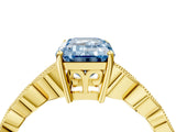 Yellow gold Fancy Blue Emerald Cut Solitaire Diamond Ring with Infinity Twist Band and Four-Prong Setting_4