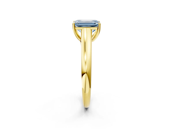 Yellow gold Fancy Blue Emerald Cut Solitaire Engagement Ring with Tapered Band and Four-Prong Setting