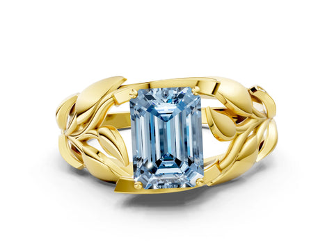 Yellow gold Fancy Blue Emerald Cut Solitaire Leaf-Inspired Engagement Ring with Prong Setting