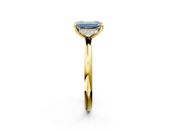 Yellow gold Fancy Blue Emerald Cut Diamond Solitaire Ring with Thin Band and Four-Prong Setting