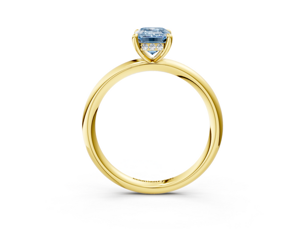 Yellow gold Fancy Blue Emerald Cut Diamond Solitaire Ring with Thin Band and Four-Prong Setting