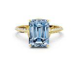 Yellow gold Fancy Blue Emerald Cut Solitaire Split Shank Pave Diamond Engagement Ring with Four-Prong Setting