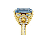 Yellow gold Fancy Blue Emerald Cut Solitaire Split Shank Pave Diamond Engagement Ring with Four-Prong Setting_29